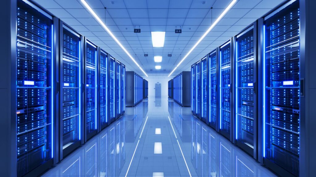 Image of server racks in modern server room data center by Sashkin via Shutterstock