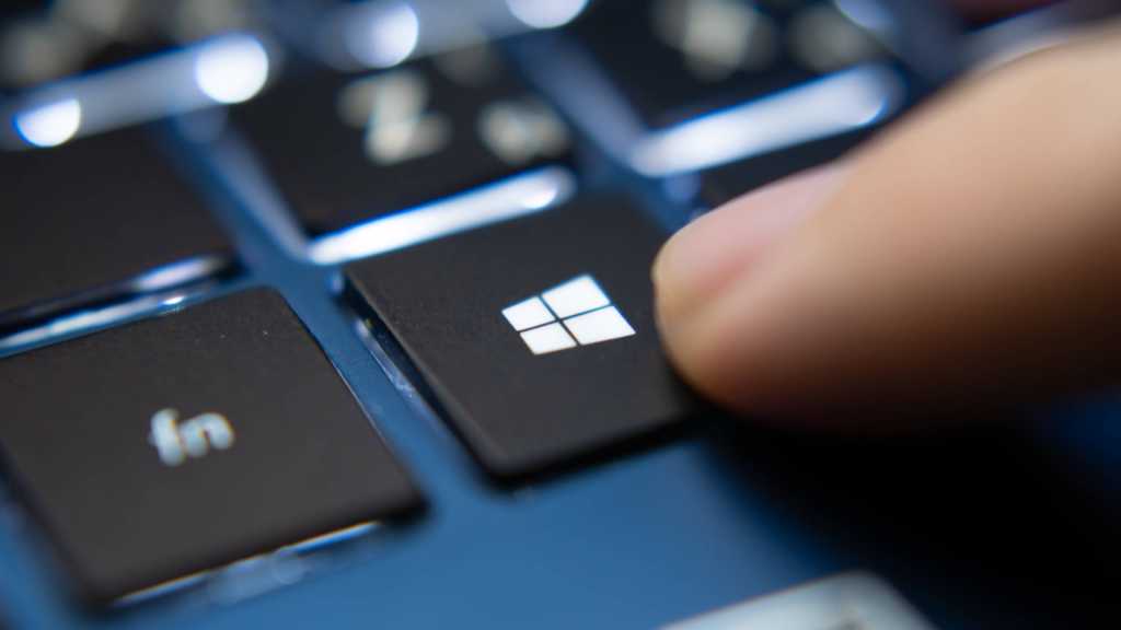 Microsoft’s AI Uncovers 16 Windows Vulnerabilities, Including Four Critical Remote Code Execution Flaws Finger-pressing-Windows-key-on-a-blue-laptop-keyboard