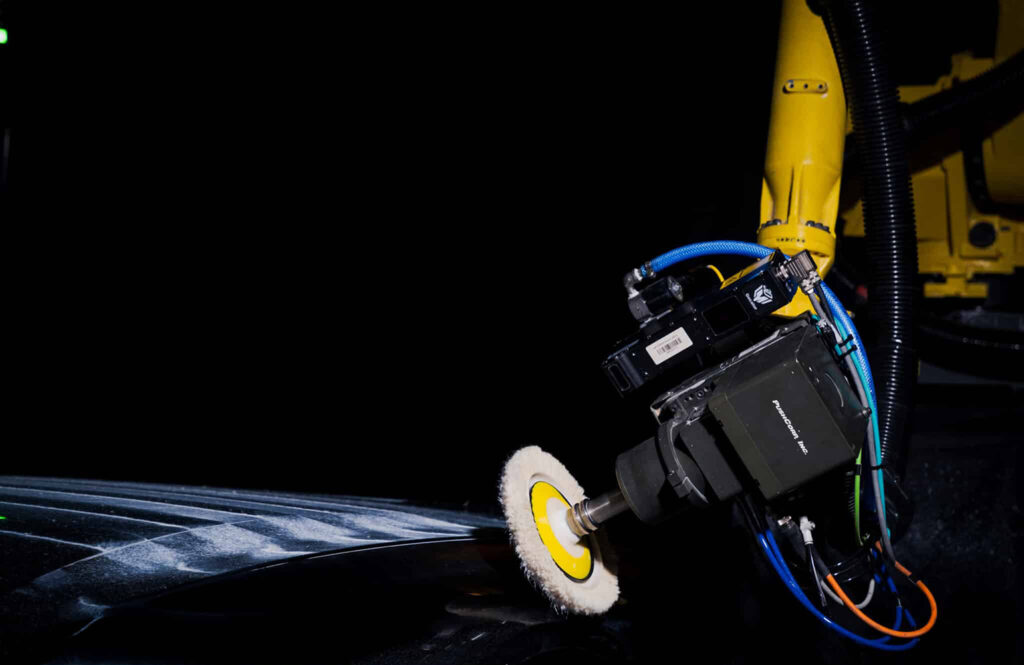 Autonomous Finishing Could Be the Key to Defense Manufacturing Success A GrayMatter Robotics robot buffing a part.