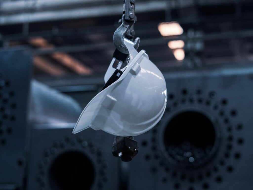 Bulletproofing the Production Line: Cyberattack Survival Plans That Actually Work Safety hat in a smart factory as Make UK’s cybersecurity in manufacturing report puts recovery at the centre of factory planning.