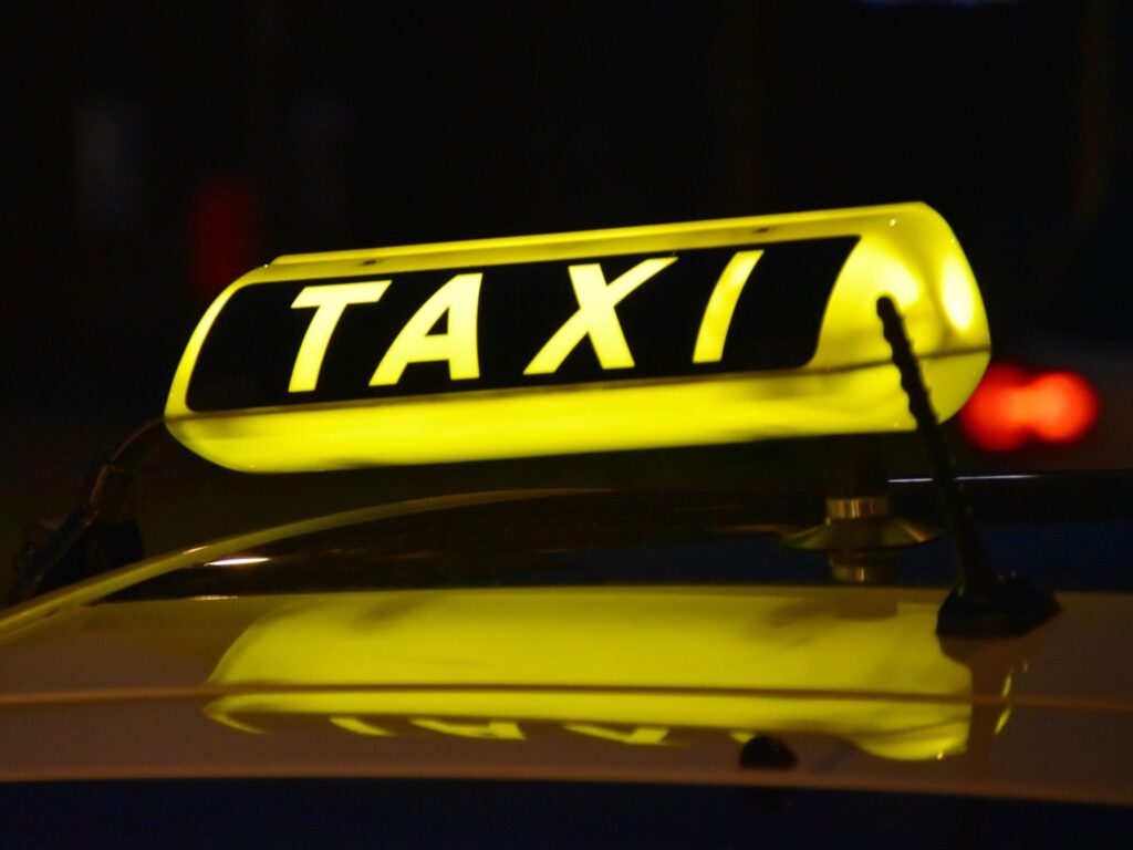 Taxi sign as Nvidia is releasing Alpamayo 2 Super, an open reasoning model that is licensed for commercial robotaxi and AV development.