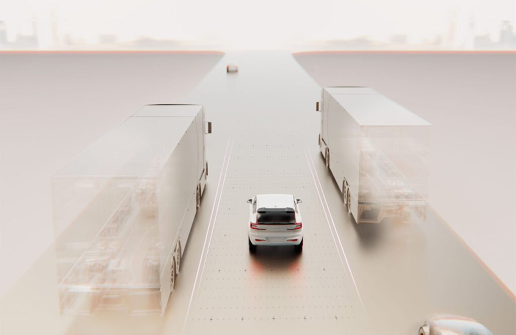 A $70 Million Vote of Confidence: Helm.ai’s Foundation Models Sweep Commercial Contracts An image of a car driving on a simulated road next to simulated trucks. Helm.ai has signed several commercial partners.
