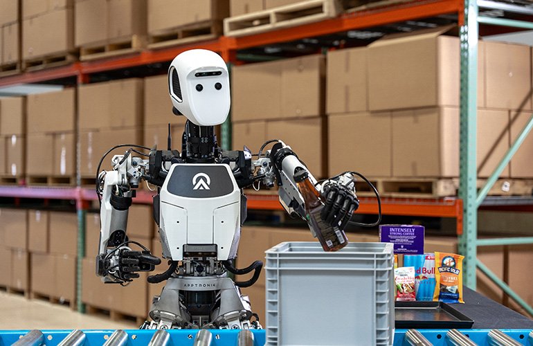 Inside the Race to Mass-Produce Humanoid Robots apollo humanoid robot in a kitting application.