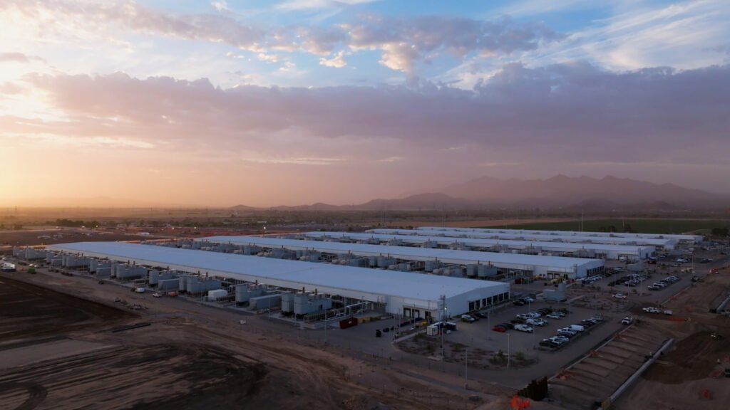 Revolutionizing Hardware Security with Integrated Open-Source HSM Technology A datacenter with a sunset sky overhead