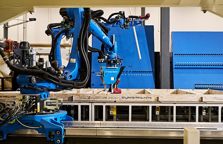 The Future of Homebuilding: Promise Robotics and D.R. Horton Join Forces to Bring Physical AI into the Build Process A robot arm assembling a house component. Promise Robotics says it can accelerate homebuilding by standardizing component manufacturing.